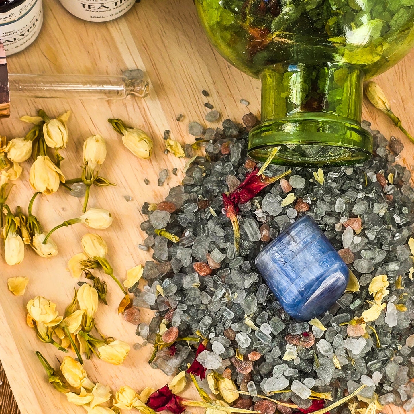 Healing Bath Salt Blend, expertly infused with eucalyptus and tea tree essential oils, and beautifully accented with carnation and jasmine flowers.