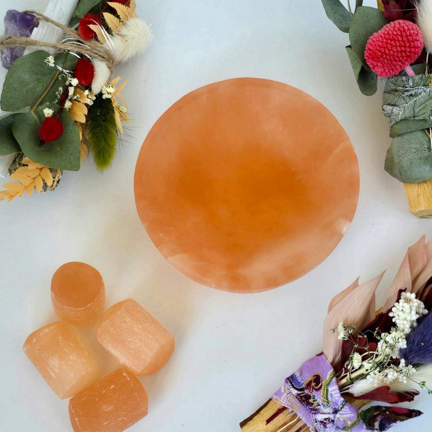 This beautifully carved trinket bowl, handcrafted from natural peach selenite, is not only a stunning decorative piece but also a powerful tool for energy cleansing and promoting positive vibrations.  Dimensions: